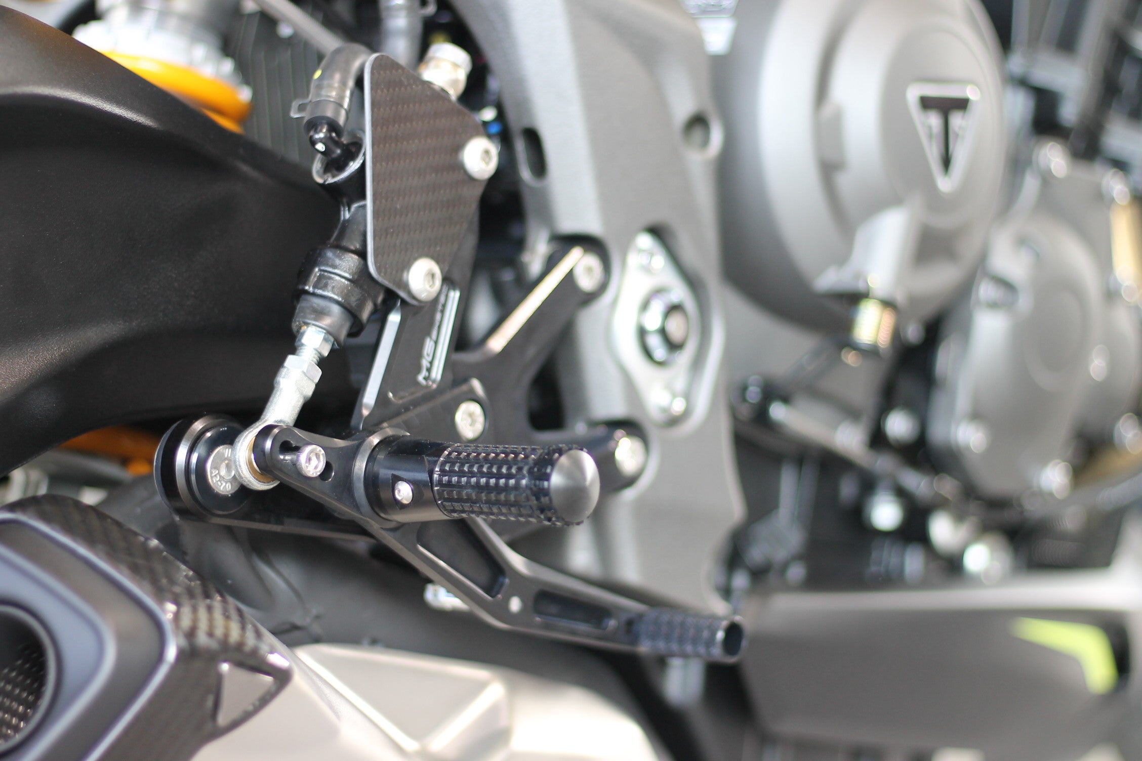 MG Biketec footrest system with ABE for Triumph Street Triple 765 RS / Moto2 2017 - 2022