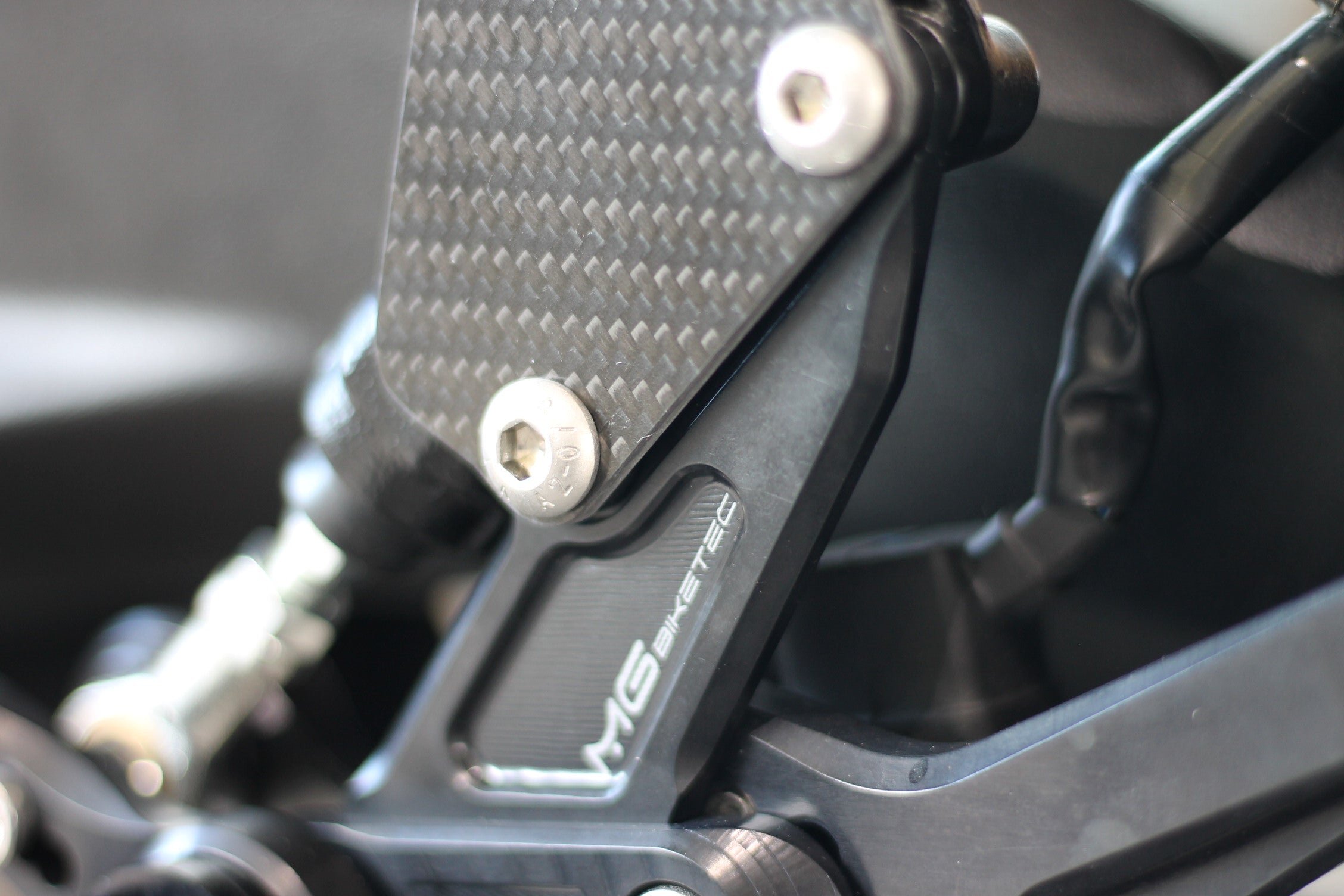 MG Biketec footrest system with ABE for Triumph Street Triple 765 RS / Moto2 2017 - 2022