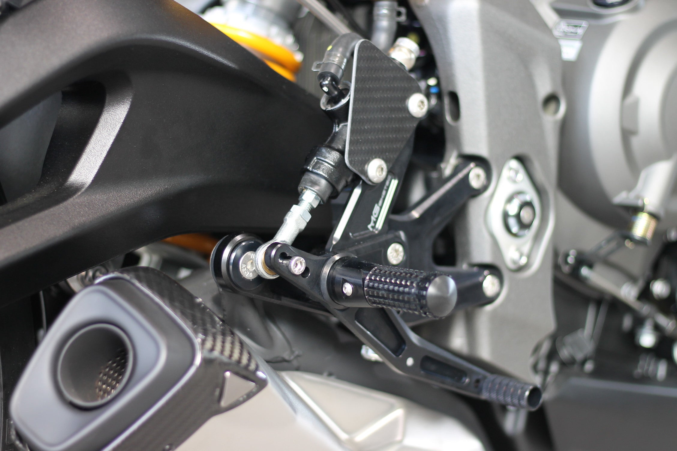 MG Biketec footrest system with ABE for Triumph Street Triple 765 RS / Moto2 2017 - 2022