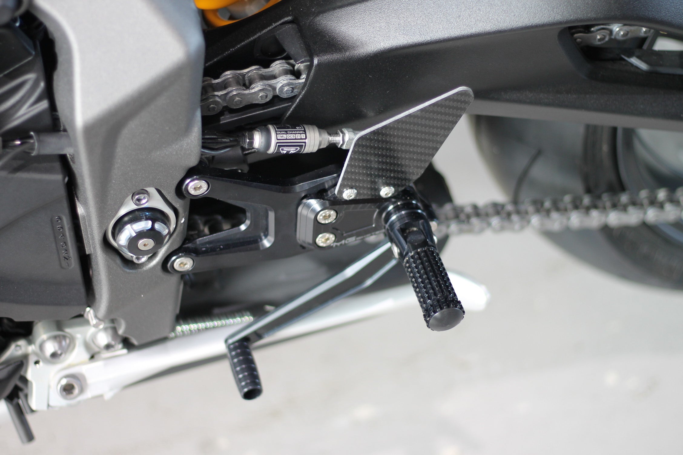 MG Biketec footrest system with ABE for Triumph Street Triple 765 RS / Moto2 2017 - 2022
